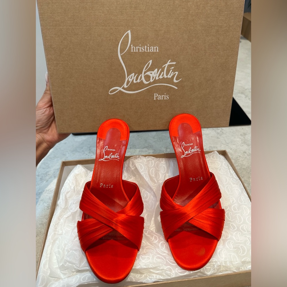 CHRISTIAN LOUBOUTIN
Nicol Is Back Crisscross Mule Sandals